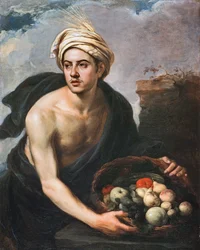 Der junge Mann mit einem Obstkorb